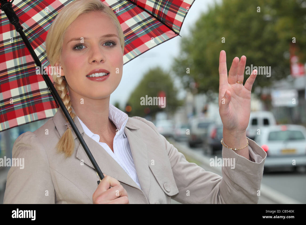 Woman hailing a cab hi-res stock photography and images - Page 4 - Alamy