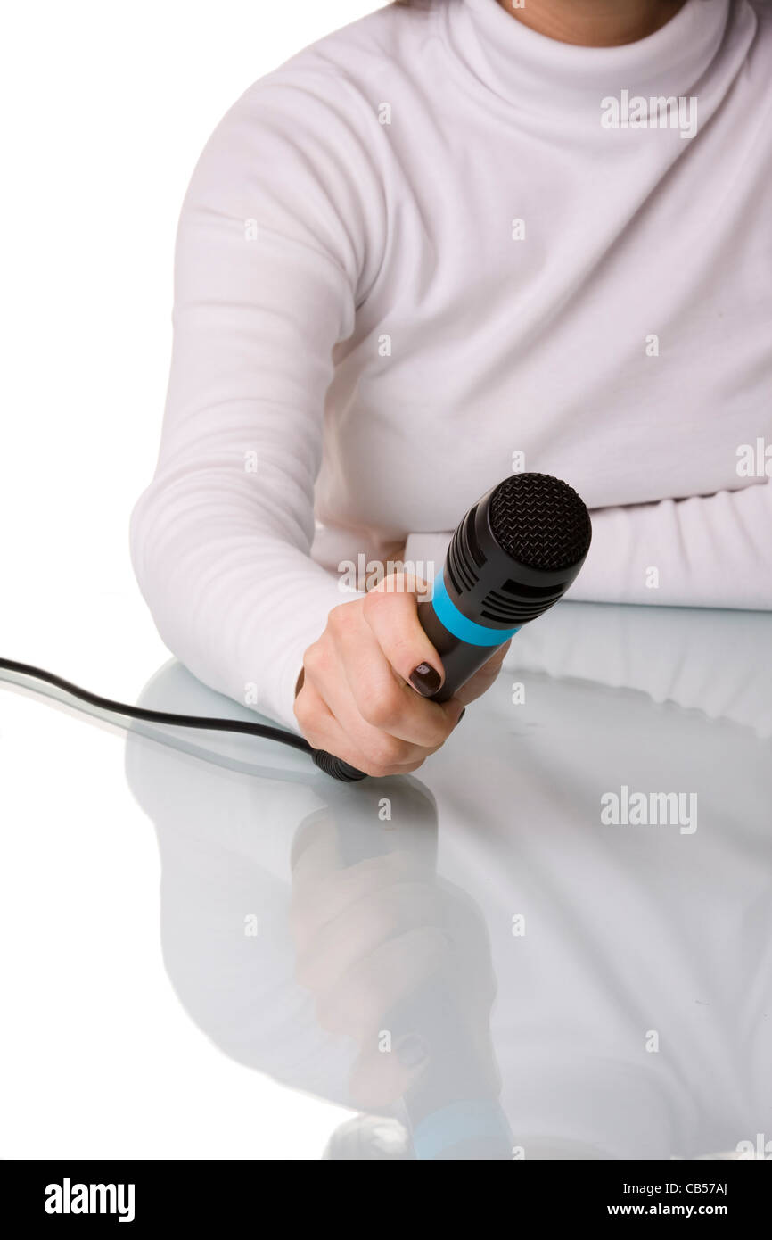 girl hand making an interview with a microphone Stock Photo