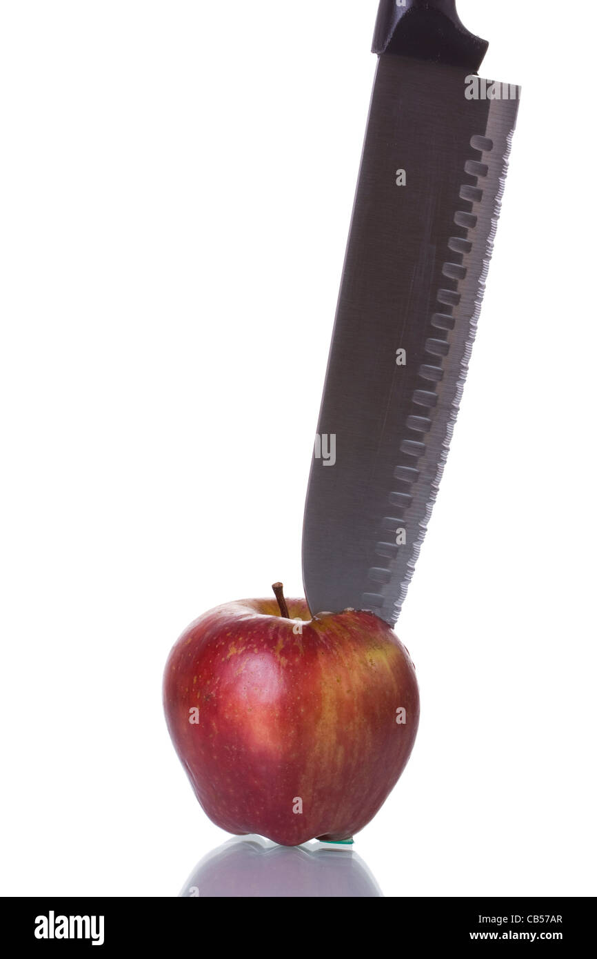 Knife cutting an apple isolated on white with reflection Stock Photo ...