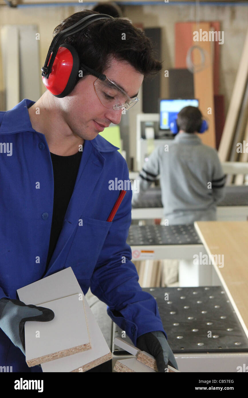 Two Men Sawing Wood Stock Photo Alamy