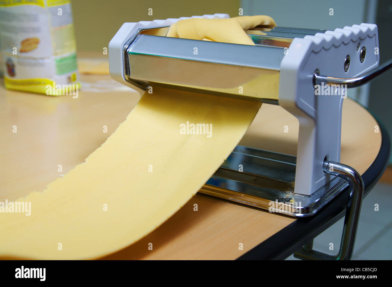 Image showcasing Making fresh pasta - flour and eggs - rolling Stock Photo - Alamy