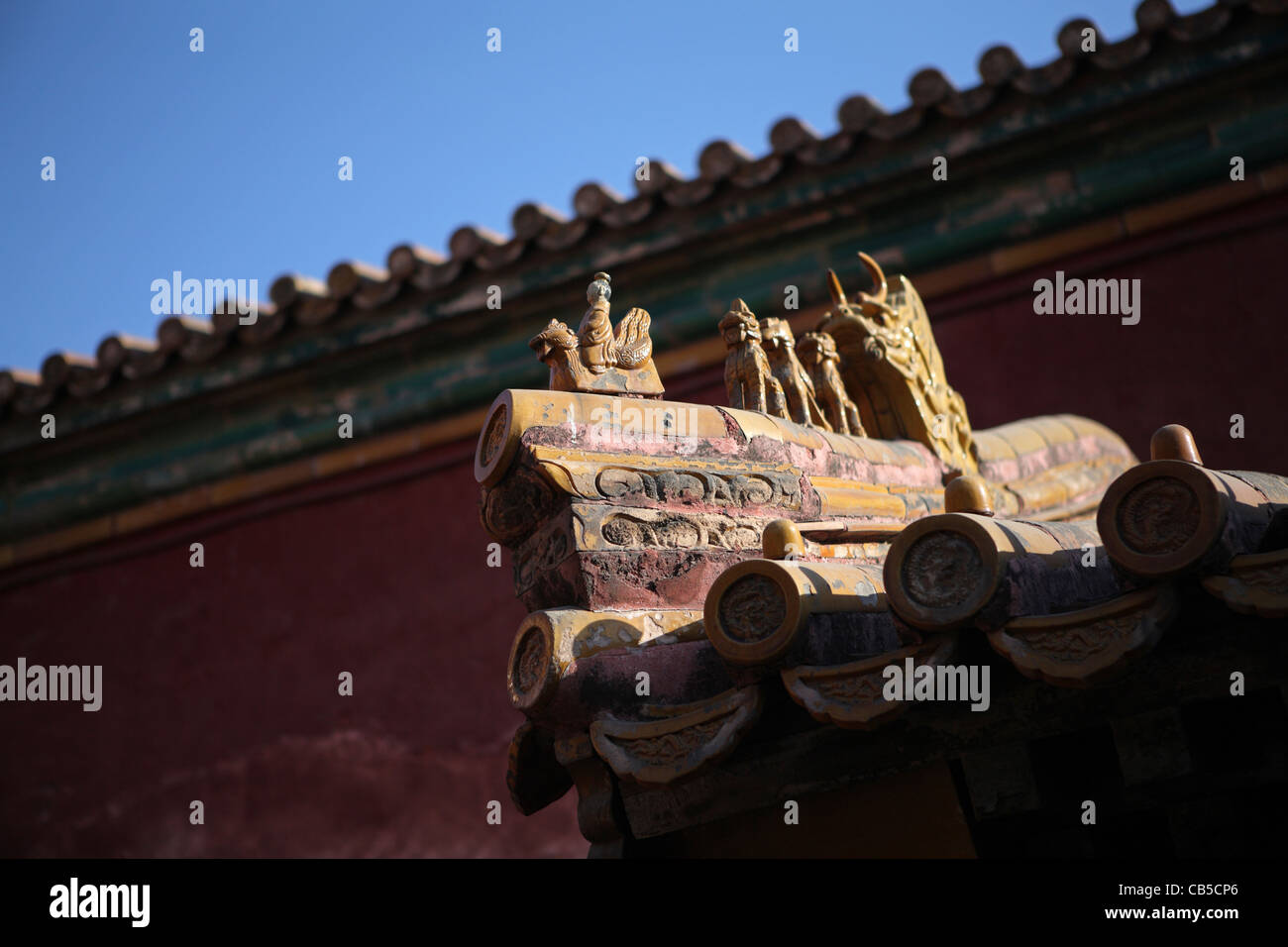 looking up at traditional Chinese ceramic tile roof detail on roof in ...
