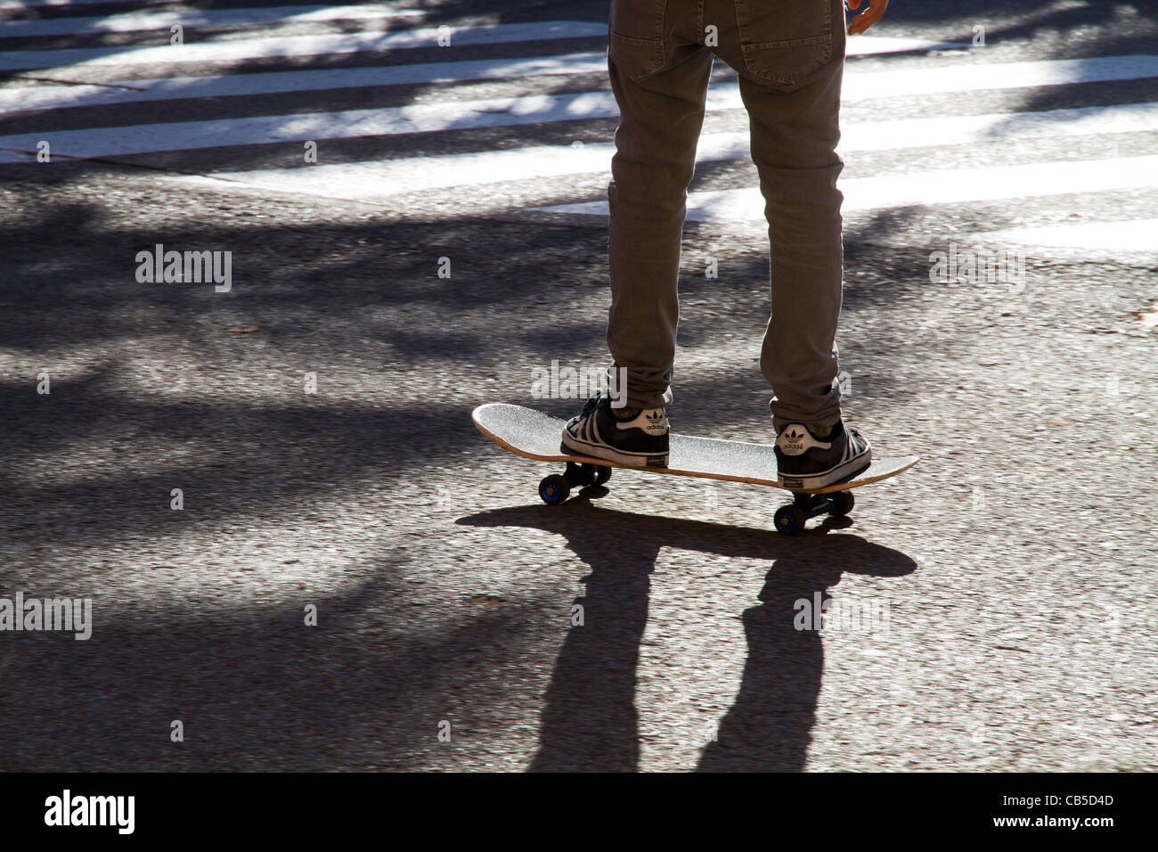 person on skateboard skateboarding in action sport Stock Photo