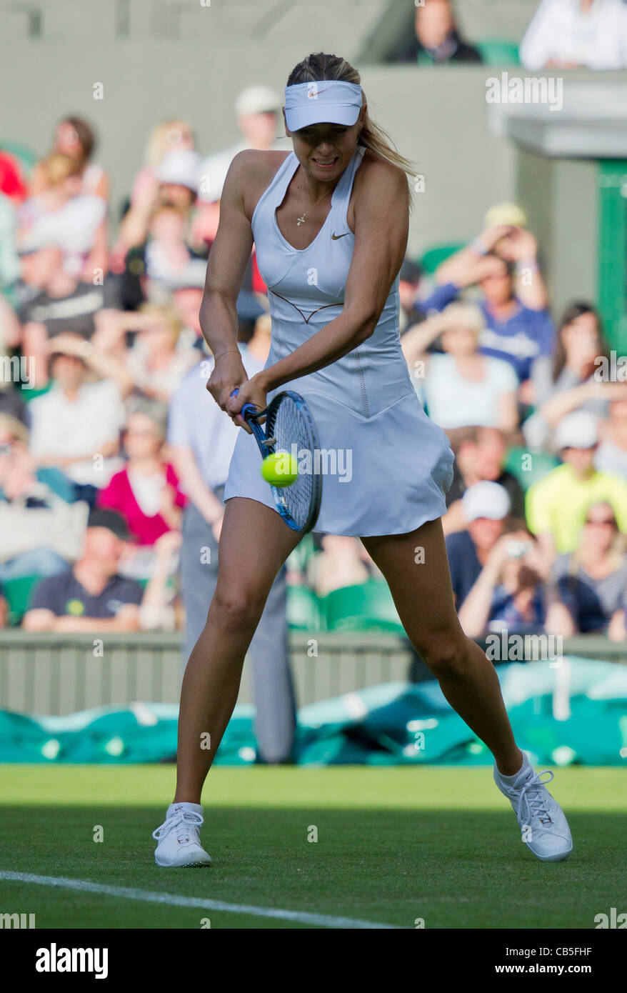 21.06.2011. Anna Chakvetadze  v Maria Sharapova. Maria won 62,61. Maria in action. The Wimbledon Tennis Championships. Stock Photo