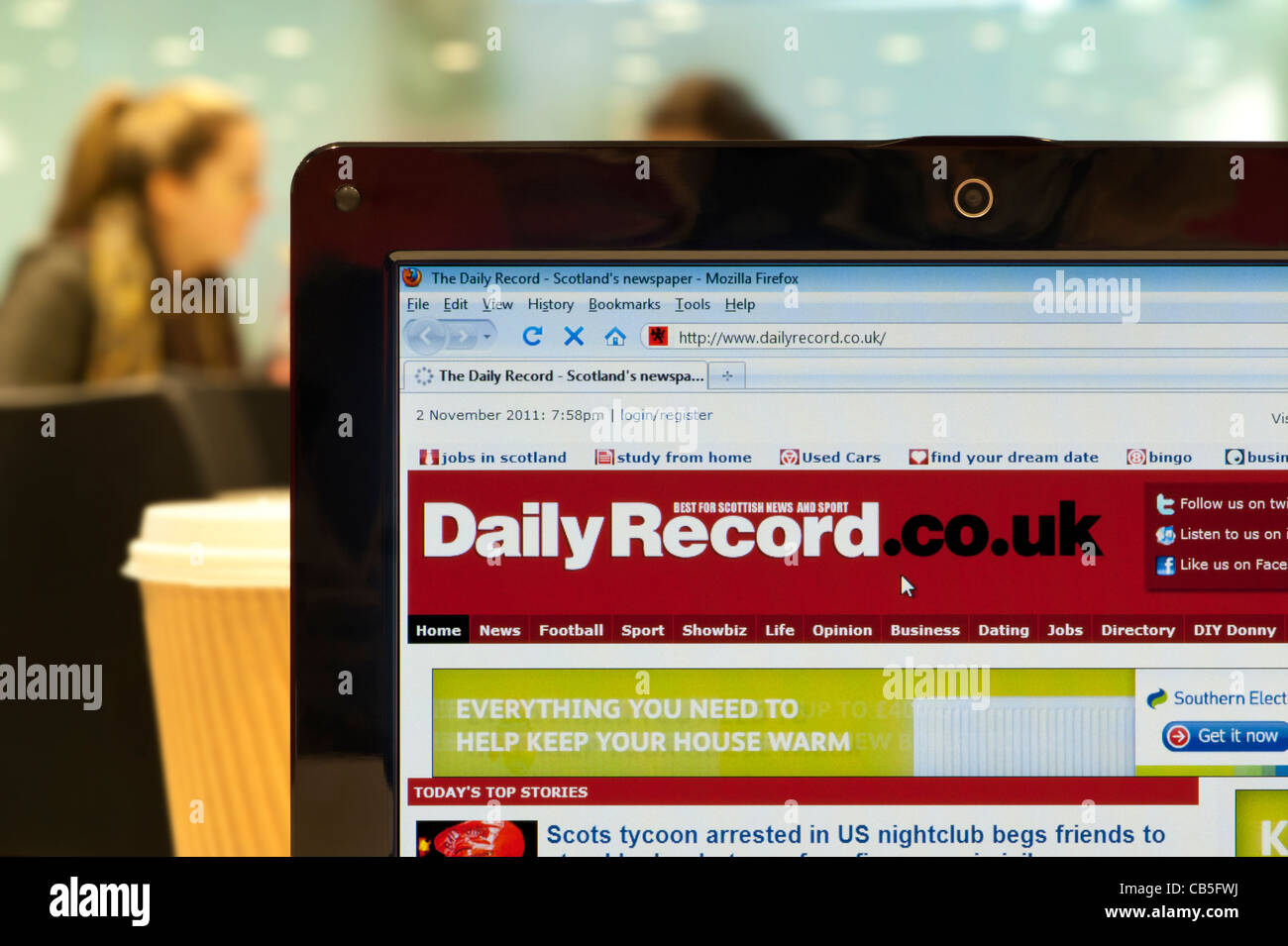 The Daily Record website shot in a coffee shop environment (Editorial use only: print, TV, e-book and editorial website). Stock Photo