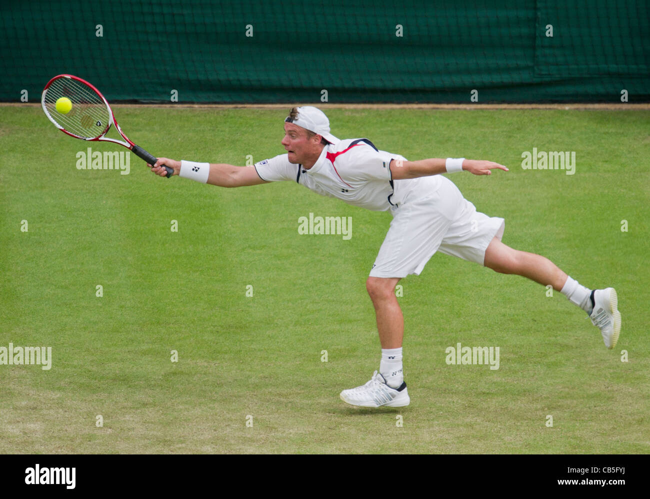 23.06.2011. Robin Soderling  defeats Lleyton Hewitt AUS 67,37,75,64. Lleyton in action. The Wimbledon Tennis Championships. Stock Photo