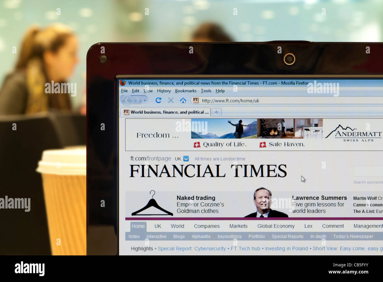 The Financial Times website shot in a coffee shop environment (Editorial use only: print, TV, e-book and editorial website). Stock Photo