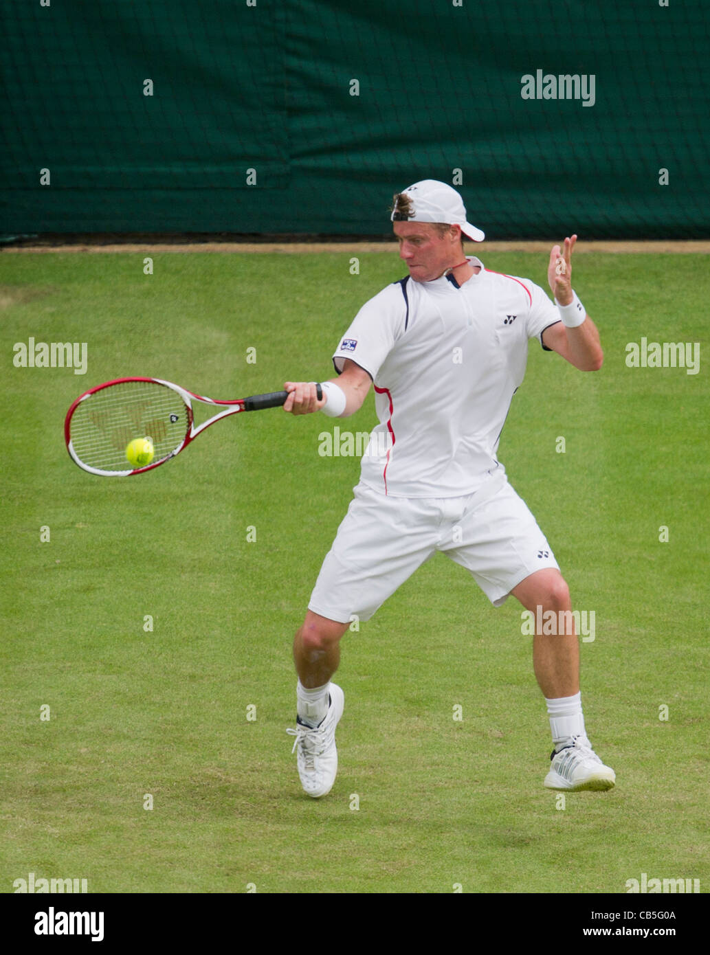23.06.2011. Robin Soderling  defeats Lleyton Hewitt AUS 67,37,75,64. Lleyton in action. The Wimbledon Tennis Championships. Stock Photo