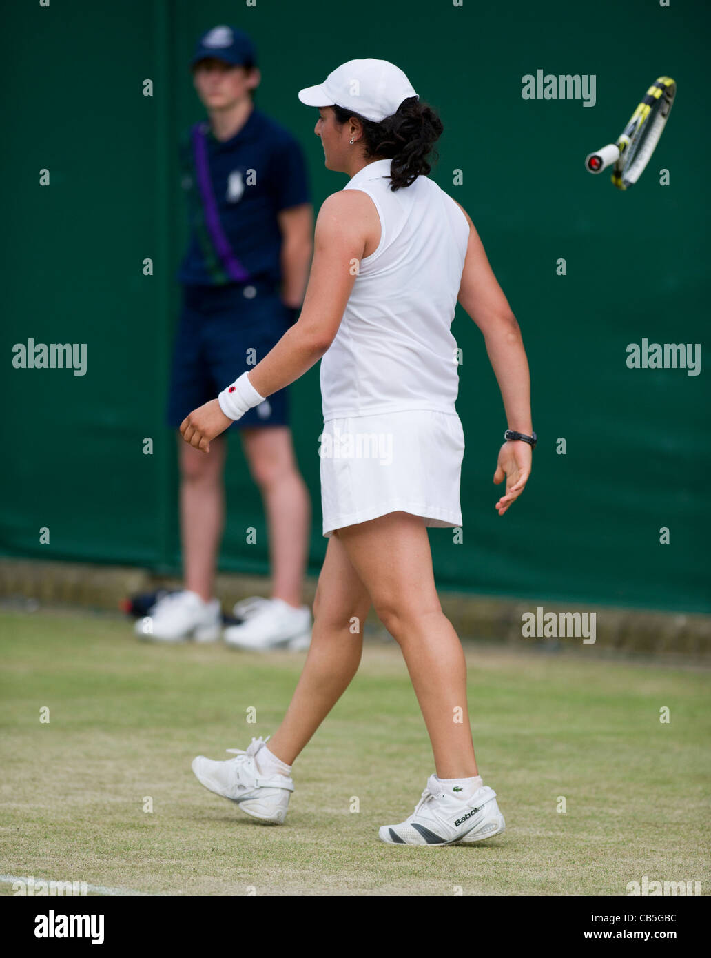 27.06.2011. Ons Jabeur TUN (4) v Risa Ozaki JAP, Girl's singles 1st round. Ons in action. The Wimbledon Tennis Championships. Stock Photo