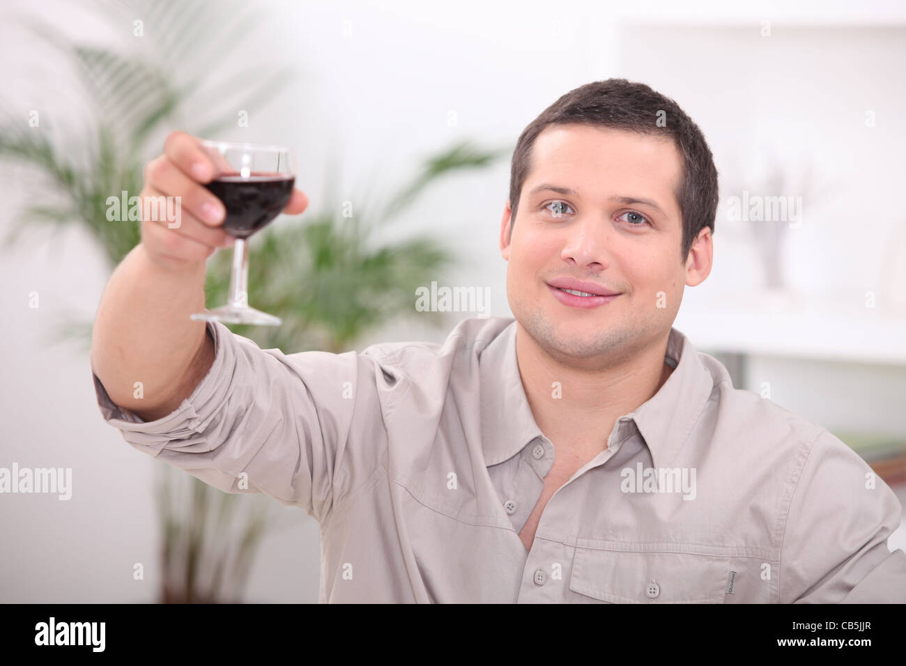Man drinking wine alone Stock Photo Alamy