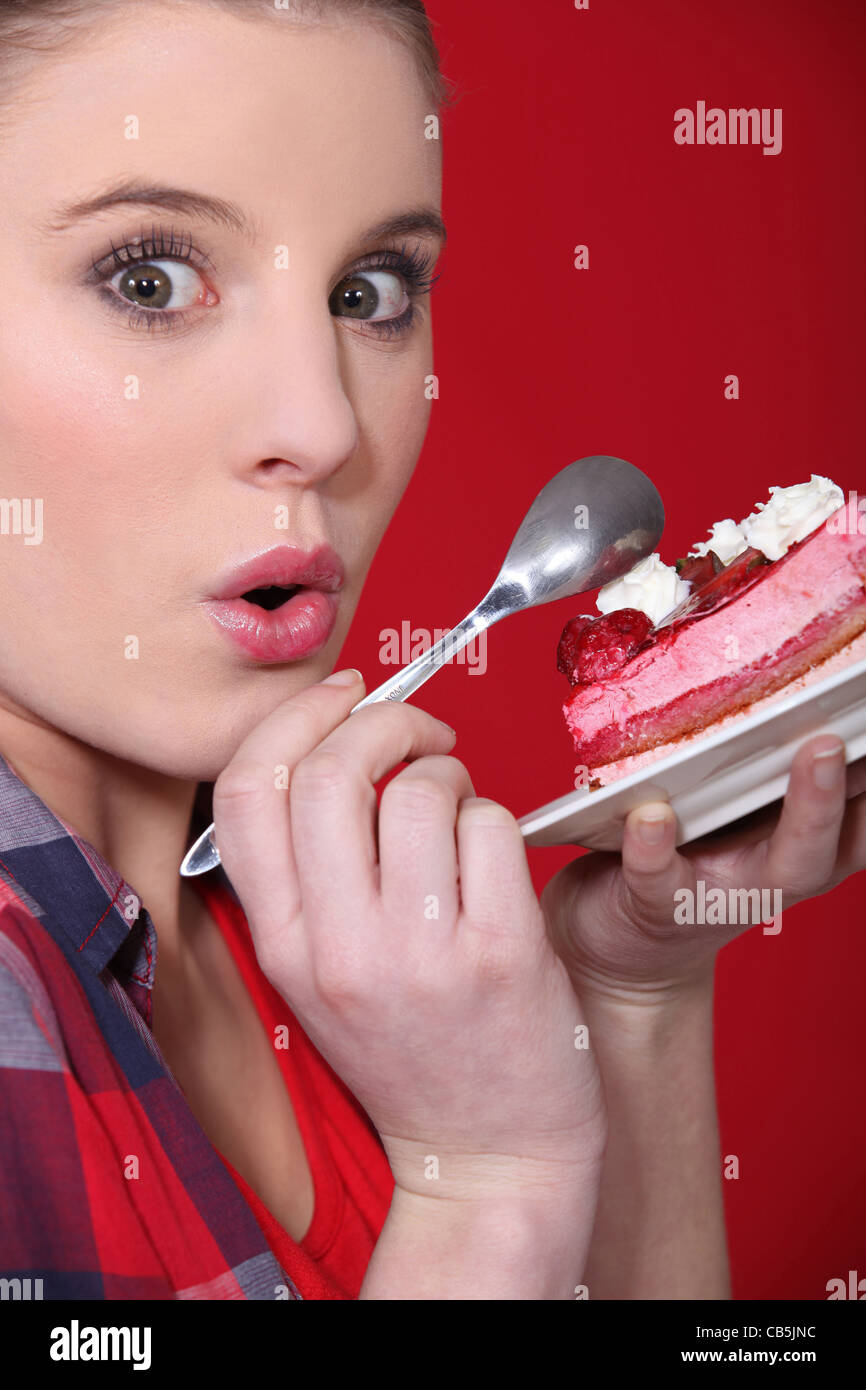 woman eating cake Stock Photo Alamy