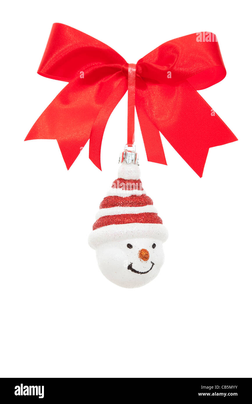Christmas ornament and red ribbon on white background Stock Photo