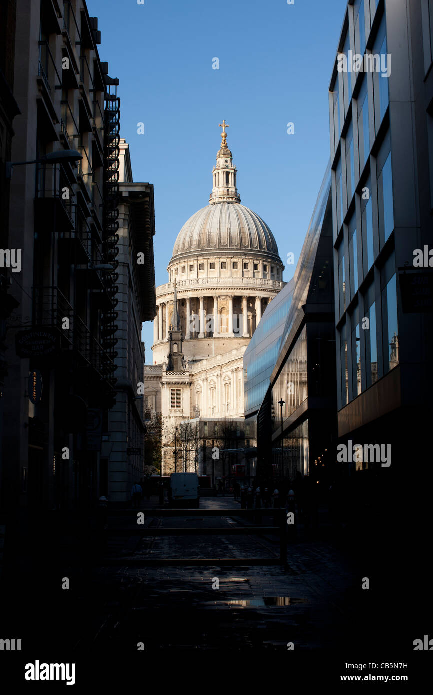 St. Paul’s Cathedral reflected in the glass walls of One New Change shopping centre Cheapside London Stock Photo