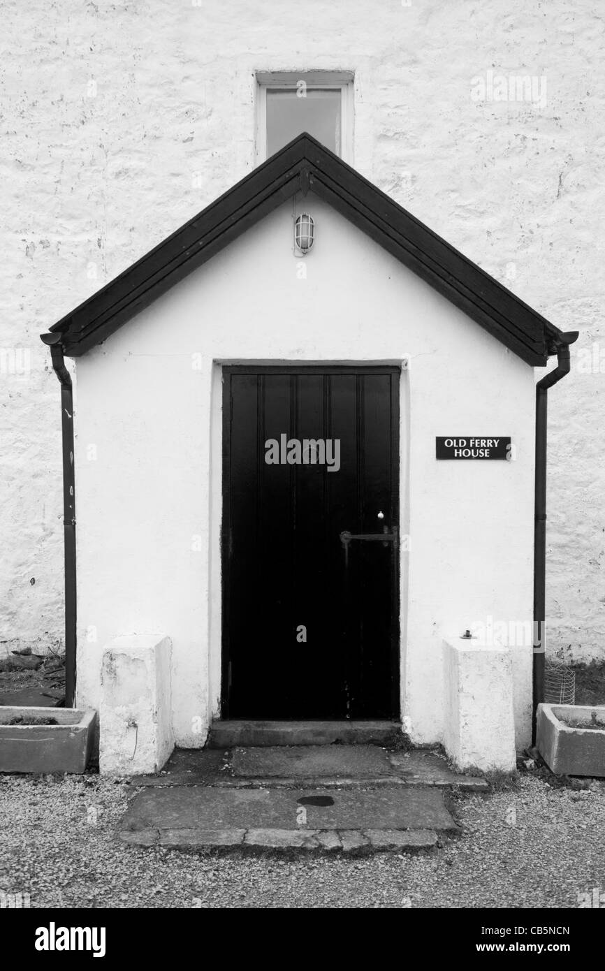 Front entrance doorway of Old Ferry House, now a remote self-catering house at Grasspoint, Loch Don, Isle of Mull, Scotland. Stock Photo