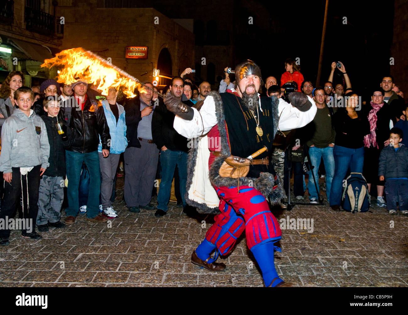 An Italian actors dresses as knight fight with sword and fire in the annual medieval style knight festival held in Jerusalem Stock Photo