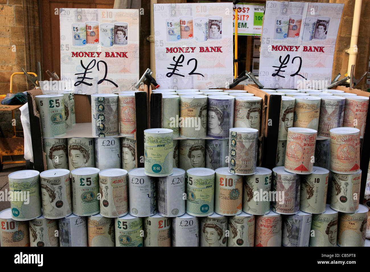 Novelty Money banks for sale at a Street Market in Sherborne Dorset