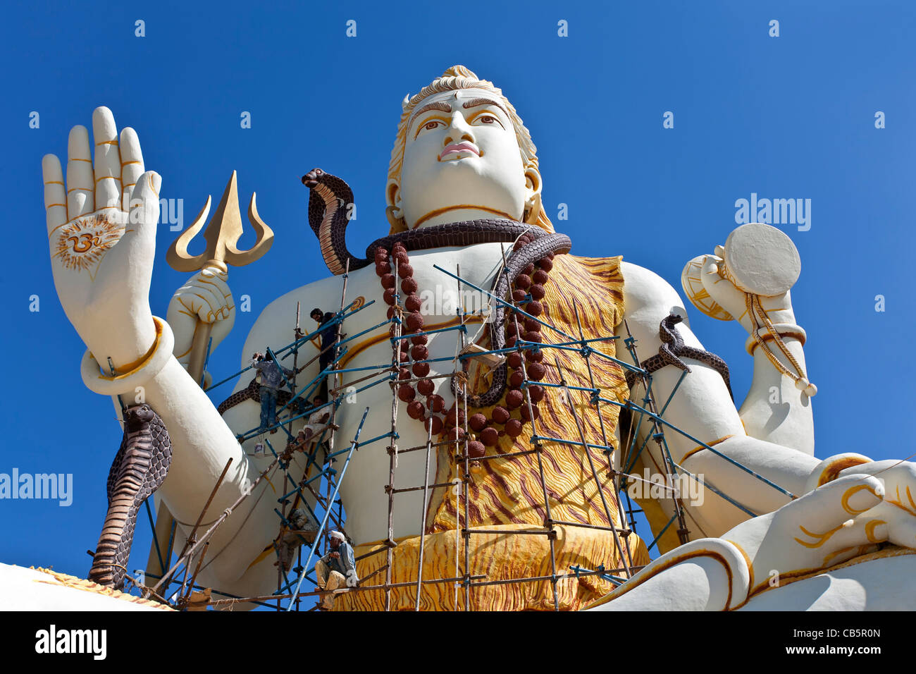 Workers Painting A Giant Shiva Statue. Near Dwarka. Gujarat. India 