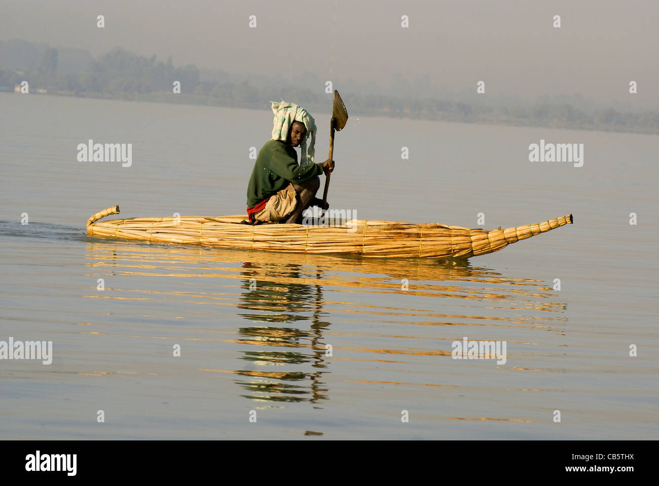 Africa, Ethiopia Man on his boat of Papyrus in Lake Tana Stock Photo