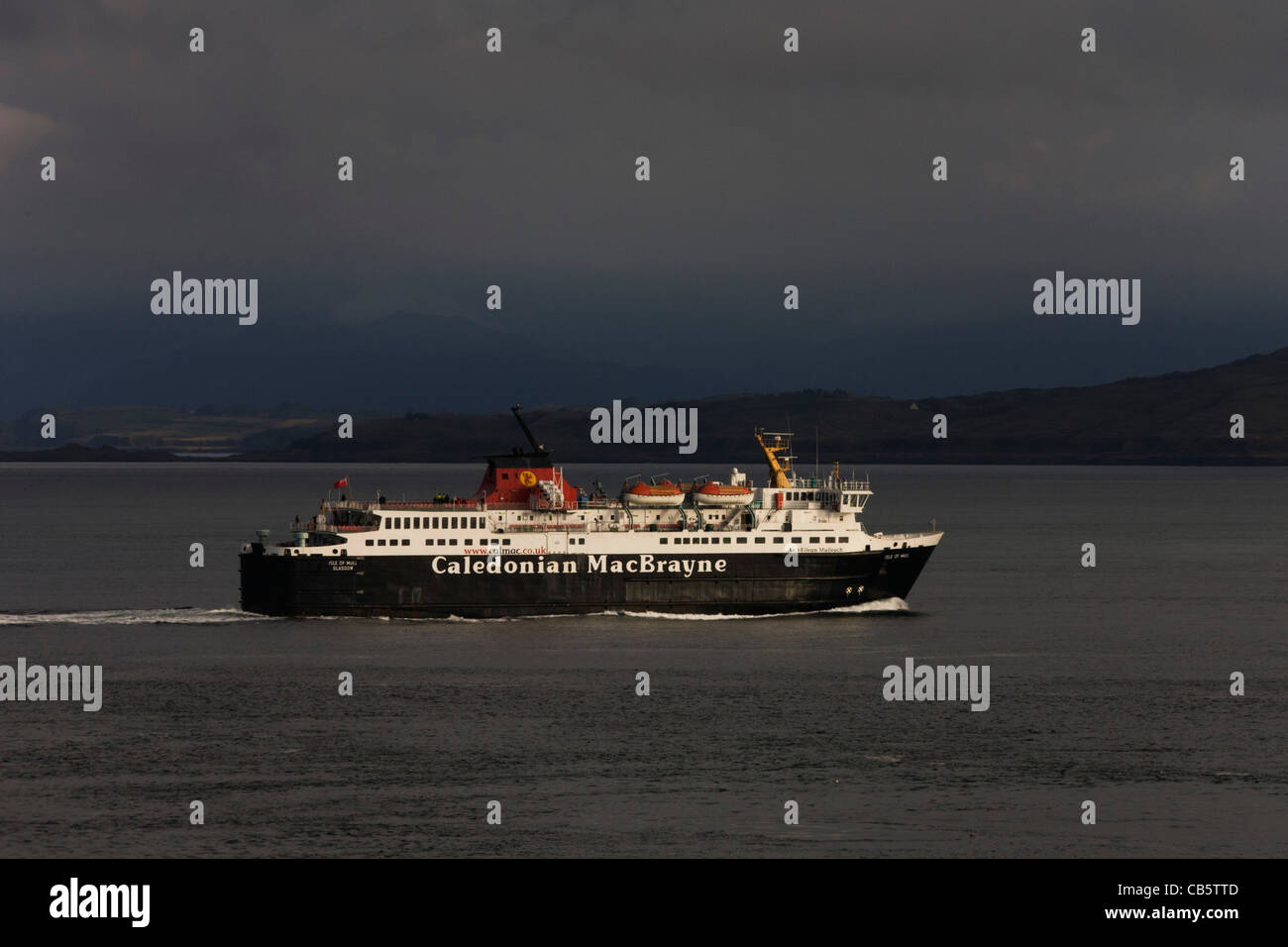 A Caledonian MacBrayne ferry sails through the Sound of Mull from Craingure to Oban. Stock Photo