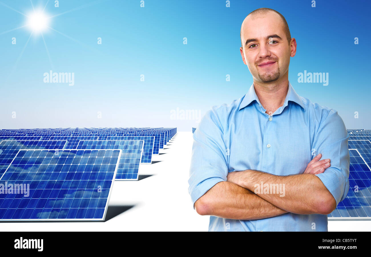 confident man and power solar station Stock Photo