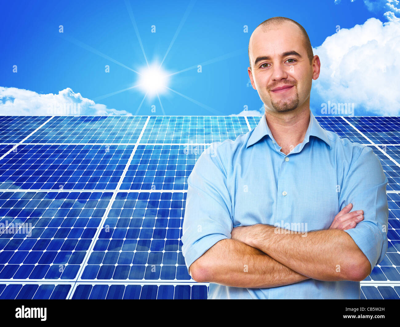 confident man and power solar station Stock Photo