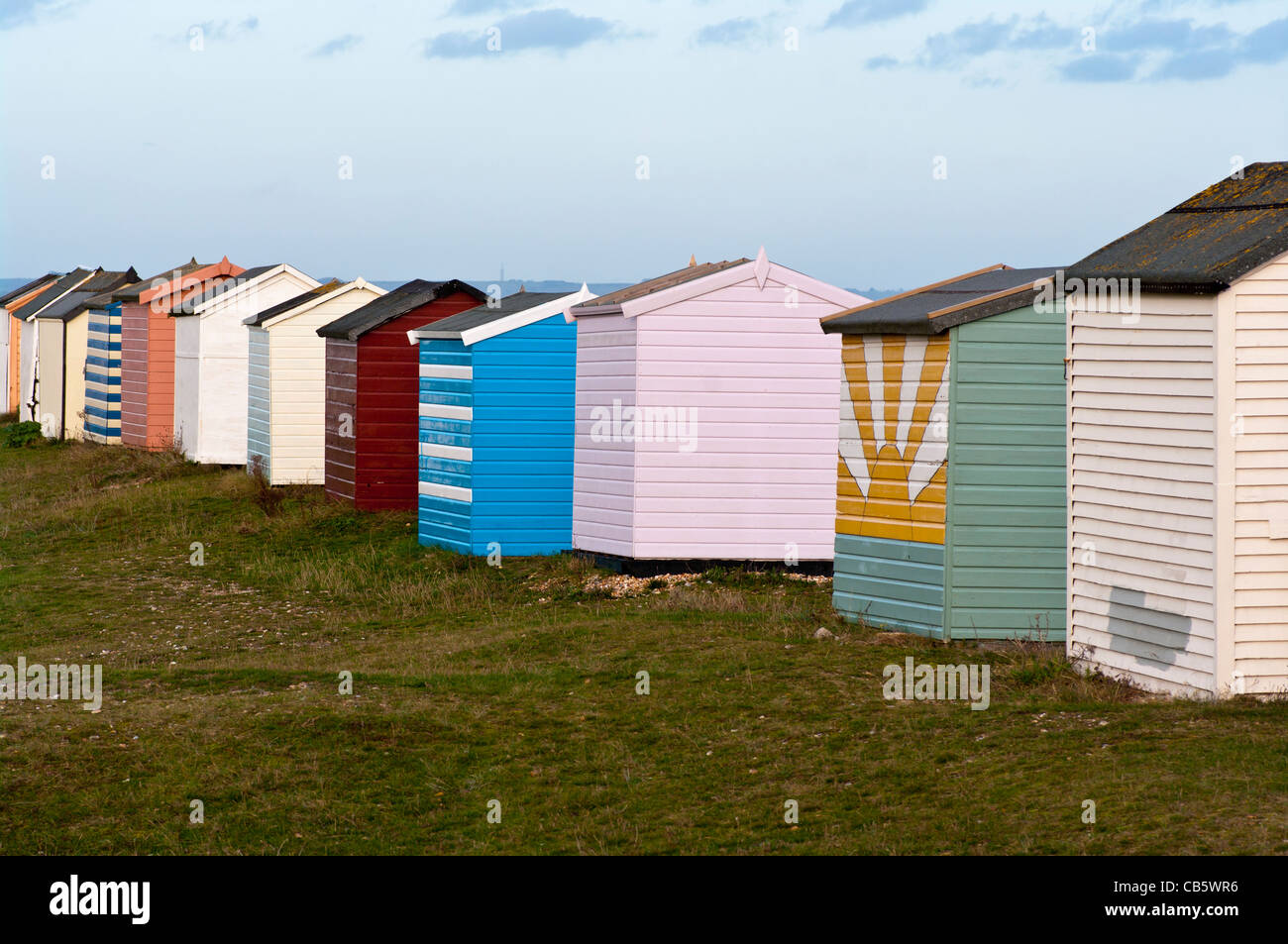 Colourful Fishermans Wooden Beach Huts Littlestone Kent England UK Stock Photo