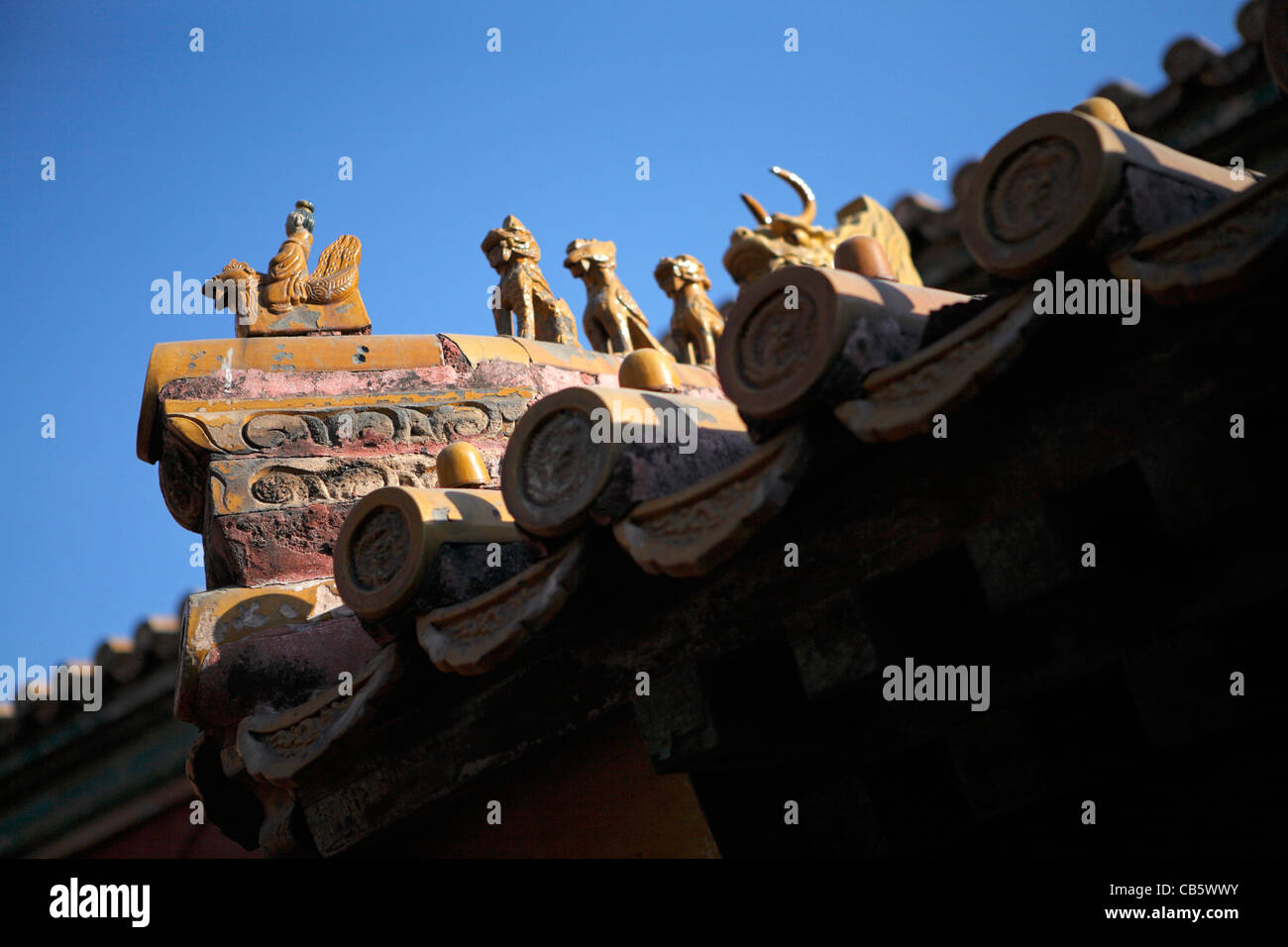 looking up at traditional Chinese ceramic tile roof detail on roof in ...