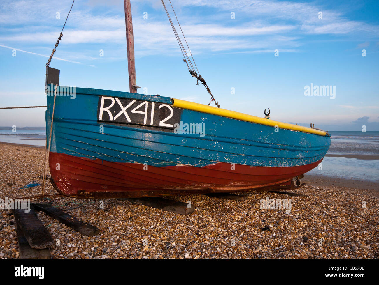 Blue Wooden Fishing Boat On A Beach Stock Photo - Alamy