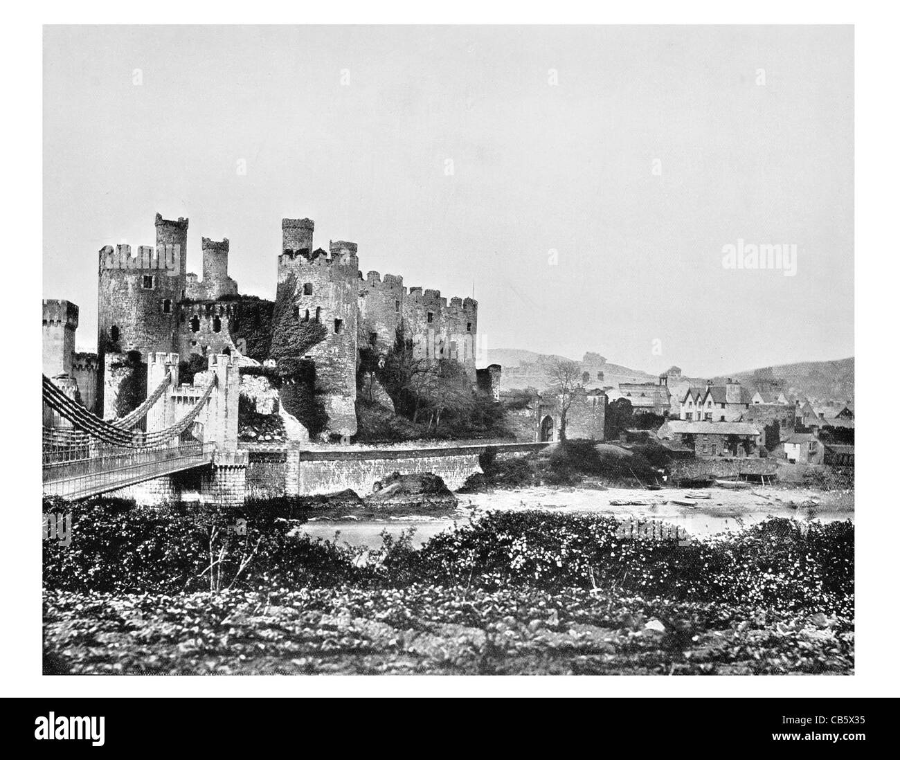 Conway Castle Medieval Wales King Edward I turrets drawbridge portcullis barbican gateway garrison prison tower Stock Photo