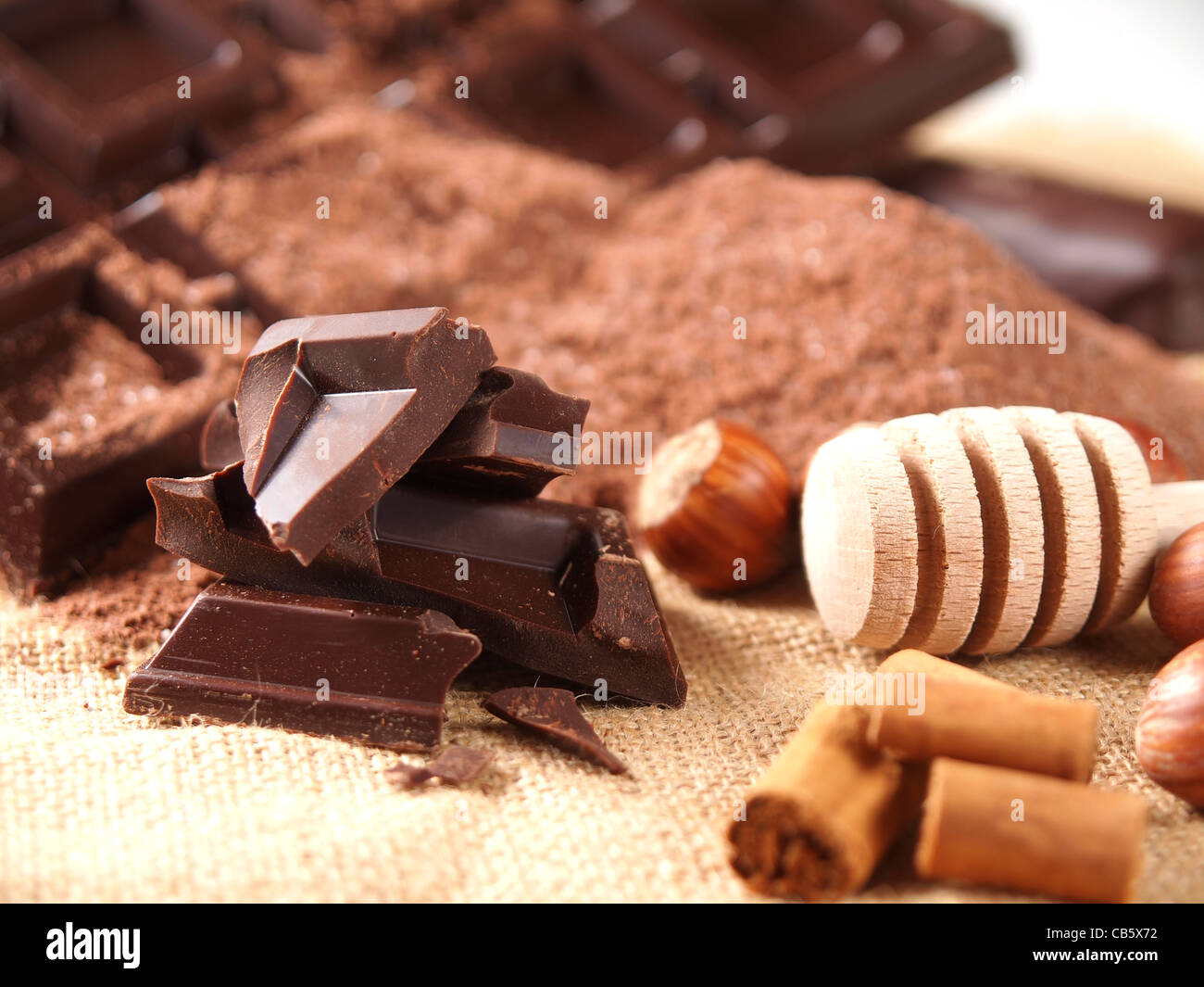 belgian chocolate bars, nuts and cocoa powder Stock Photo
