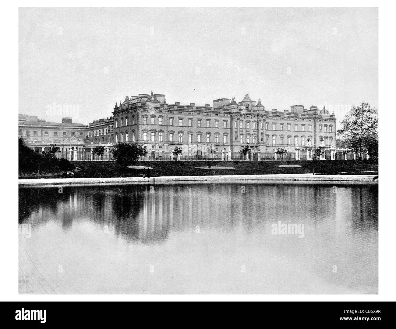 Buckingham Palace London Royal residence British monarch Westminster England Queen King lake pond Stock Photo