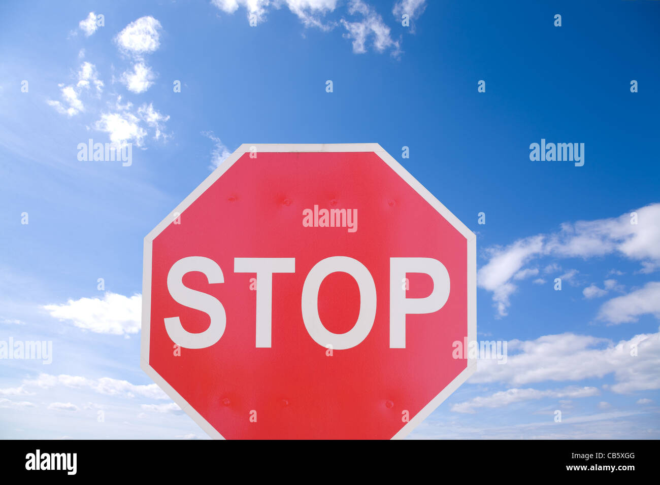 road sign on blue sky background Stock Photo