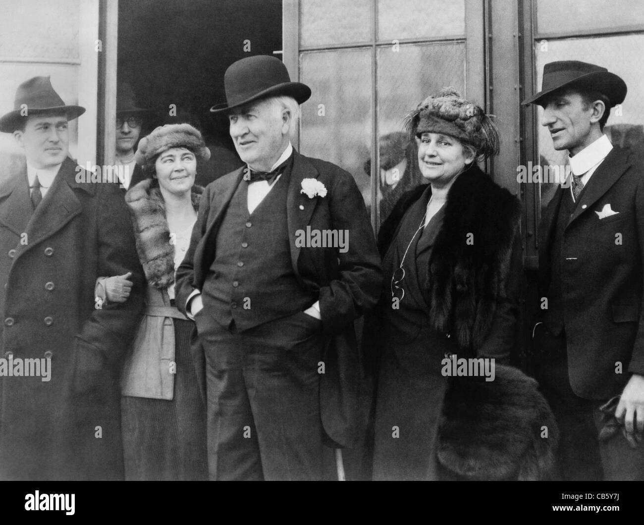 Vintage photo of American inventor and businessman Thomas Alva Edison (1847 – 1931). Edison (centre) is pictured with family members circa 1920. Stock Photo