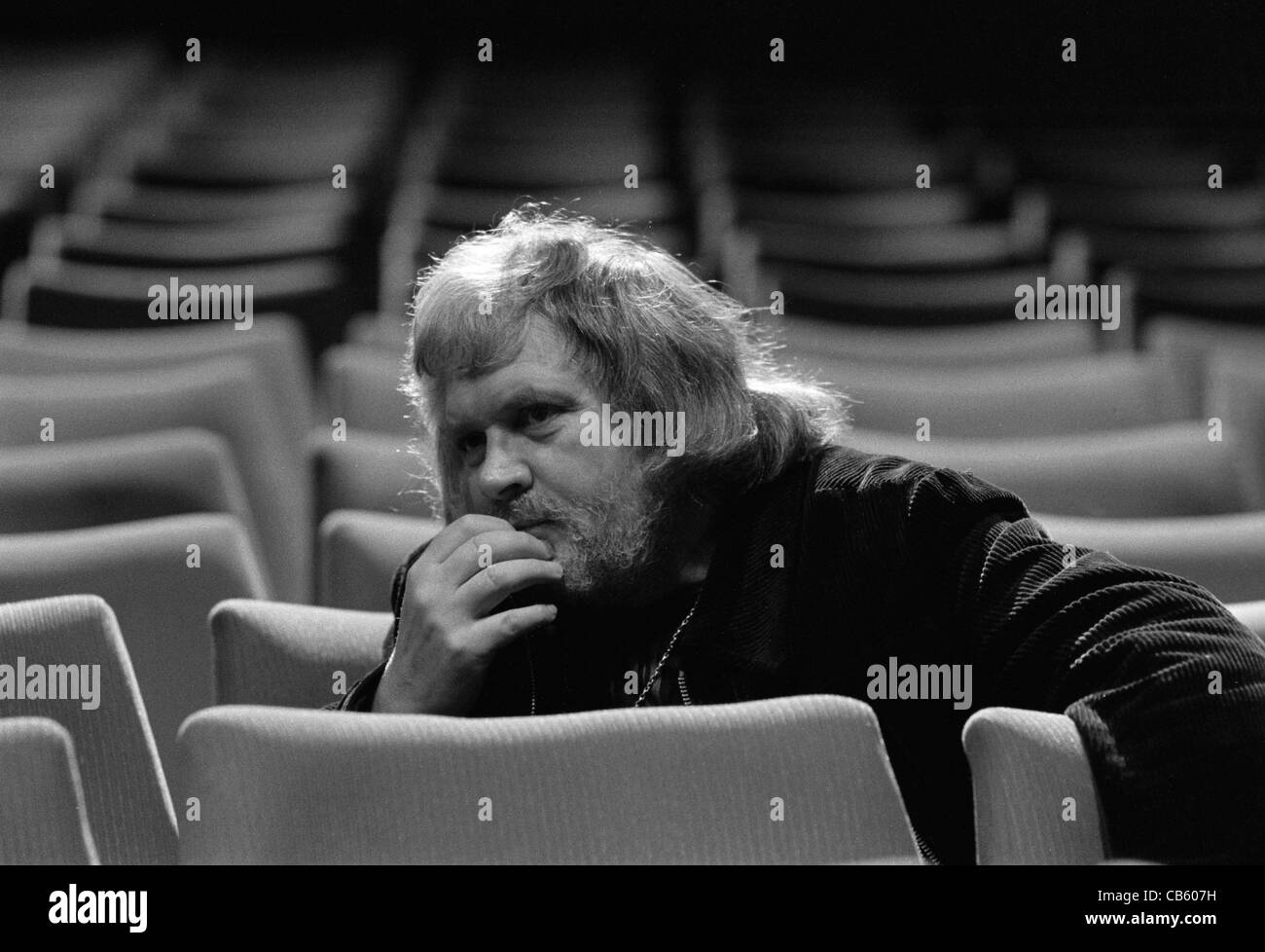 Film Director Ken Russell in auditorium of London cinema in the early 70s Stock Photo