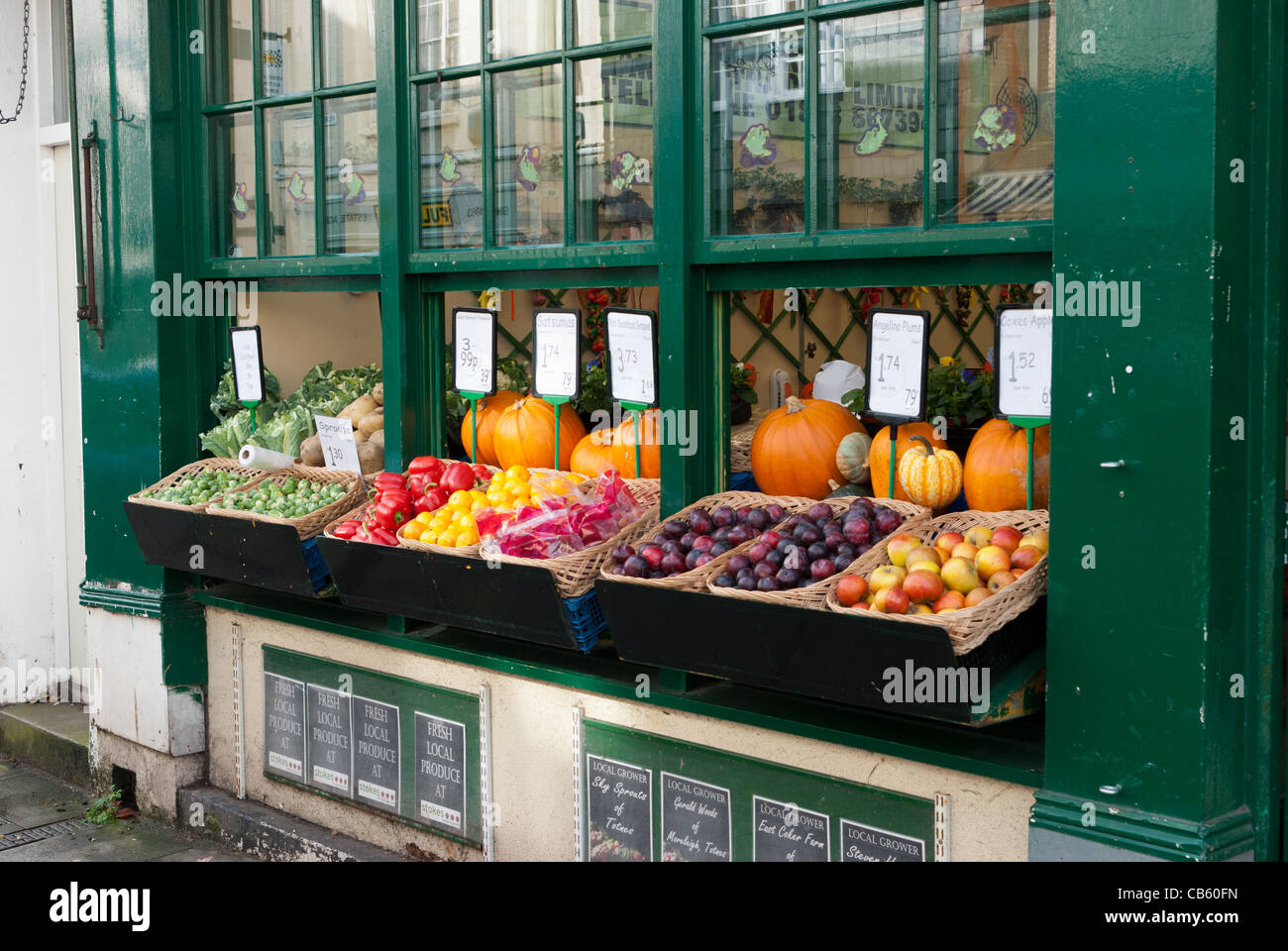 Fresh fruit and pumpkins for sale at a greengrocers in Totnes, Devon ...