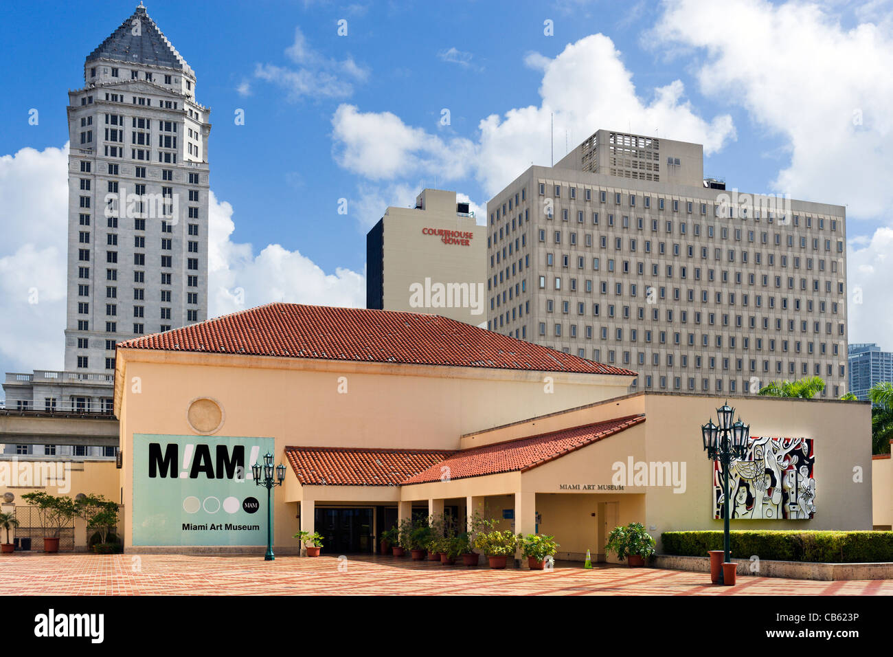 The old Miami Art Museum with the Miami-Dade County Courthouse tower behind, West Flagler Street, Miami, Florida, USA Stock Photo