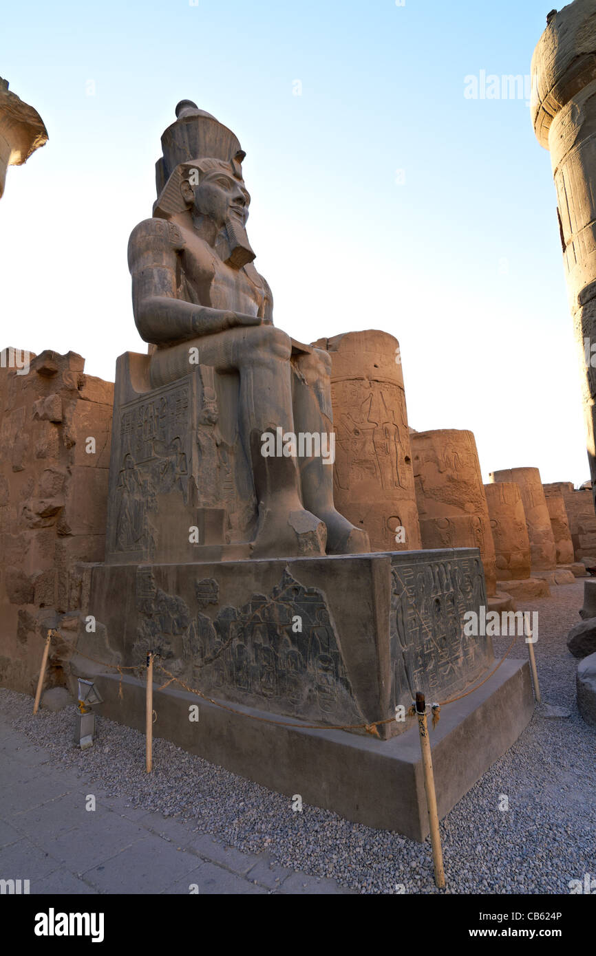 Statue of Ramses II in Luxor Temple at dawn Stock Photo - Alamy