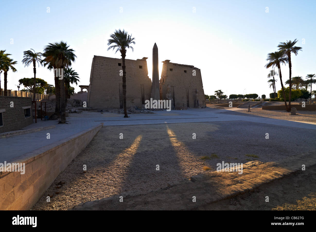 Entrance to Luxor Temple with Statues of Ramses II and Obelisk at dawn ...