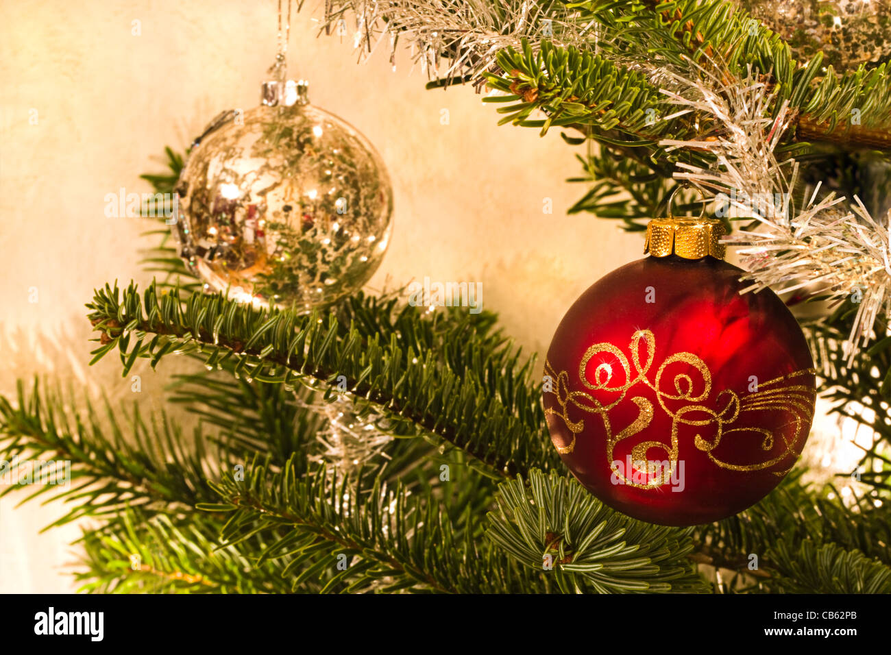 Red and silver balls in christmas tree horizontal image Stock Photo Alamy