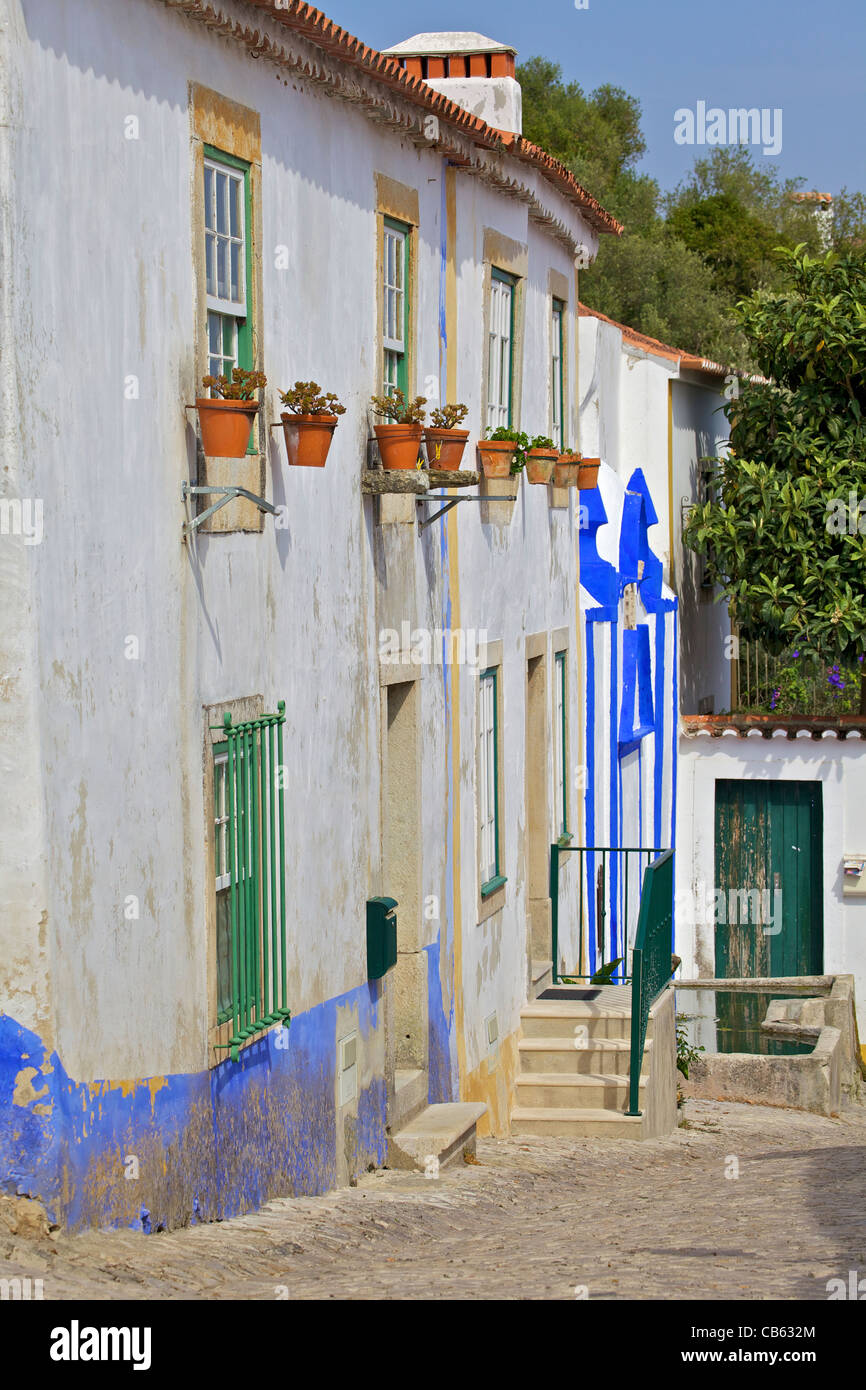 Typical Homes in in the Medieval Village of Obidos on a Sunny Day Stock Photo