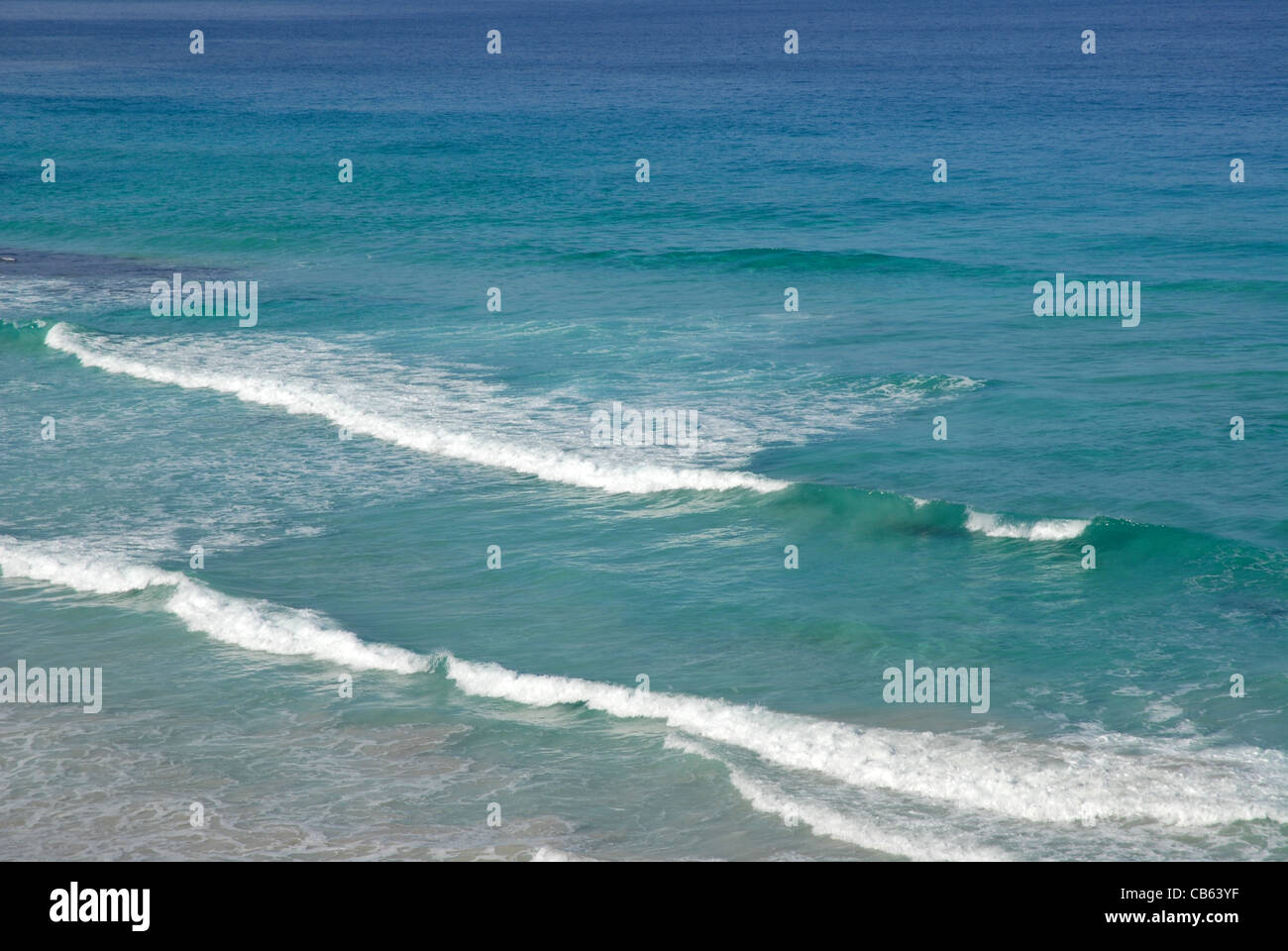 Breaking waves on calm sea hi-res stock photography and images - Alamy