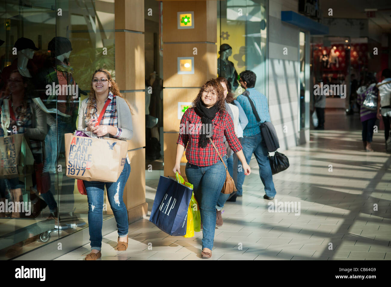 Shoppers at the Queens Center Mall in the borough of Queens in New York
