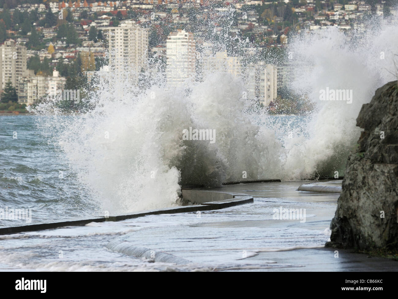 High waves crashing up against the Stanley Park seawall during a daylight windstorm, Vancouver. Stock Photo