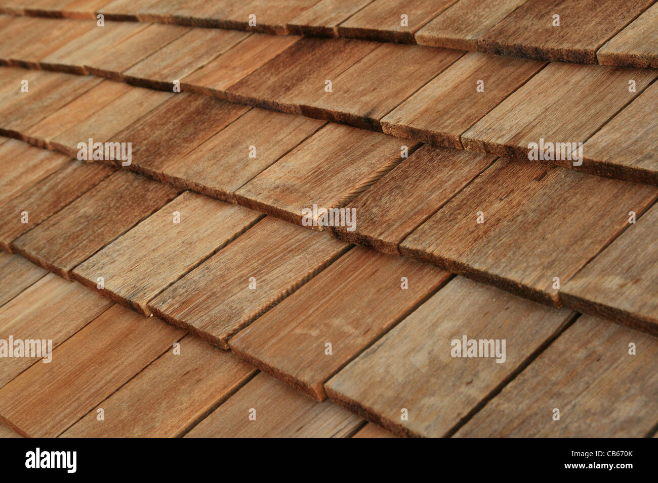 Diagonal detail of brown wood roof shingles Stock Photo