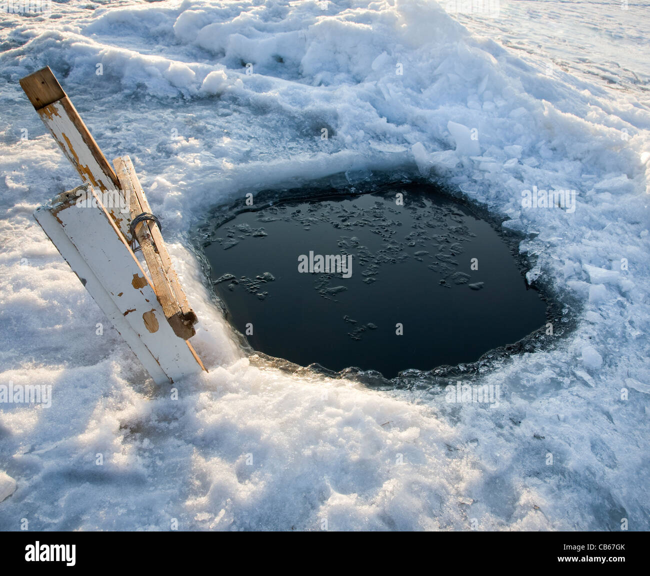 hole in the ice Stock Photo Alamy