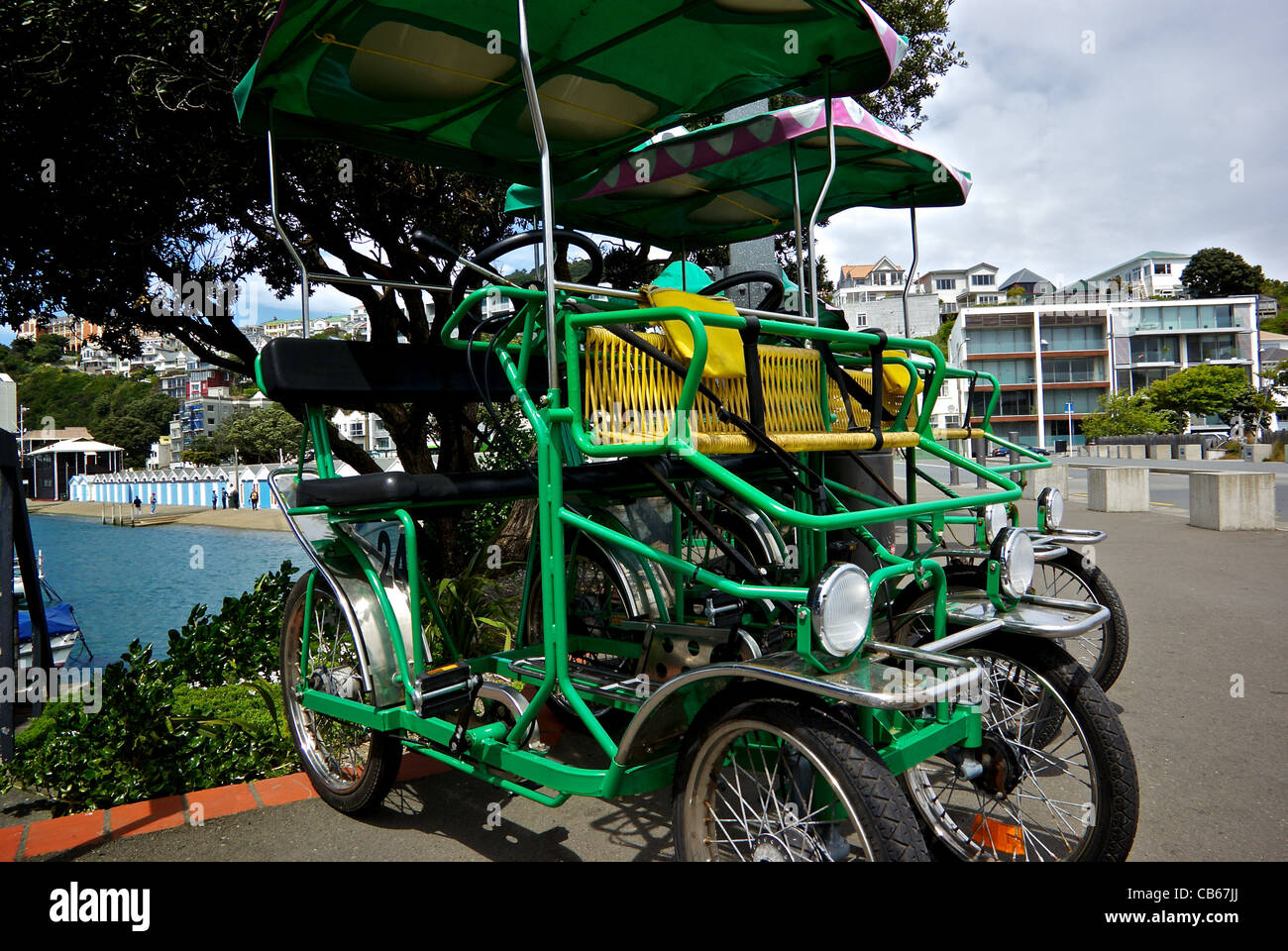 Bike rental shop display antique car pedal vehicle for rent Wellington New  Zealand harbour Stock Photo - Alamy