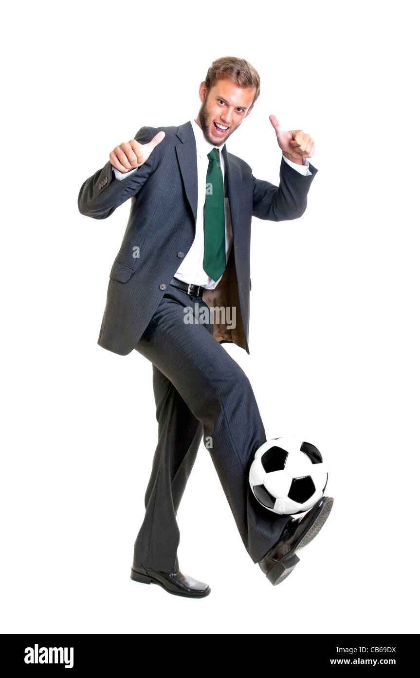 Businessman with soccer ball isolated in white Stock Photo - Alamy