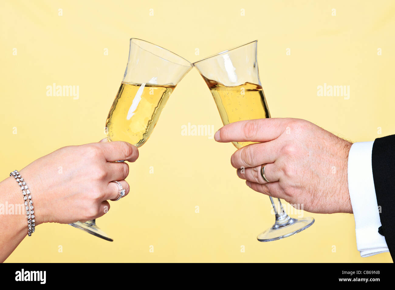 Celebration champagne toast hands hi-res stock photography and images -  Alamy