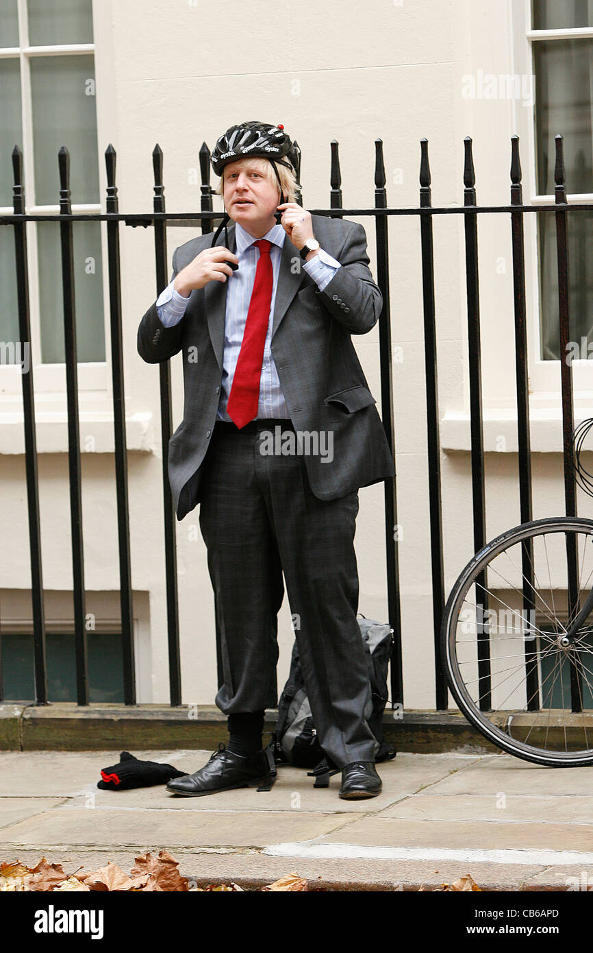 London Mayor Boris Johnson about to get on his bike in Downing Street Stock Photo