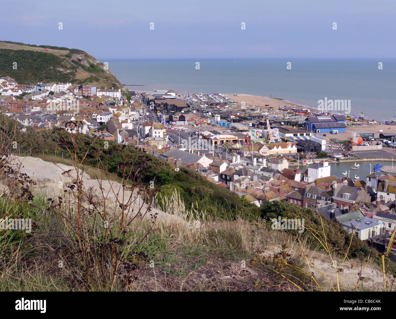 A view from the West Hill down towards Hastings seafront with the boating lake and the new lifeboat station. Stock Photo